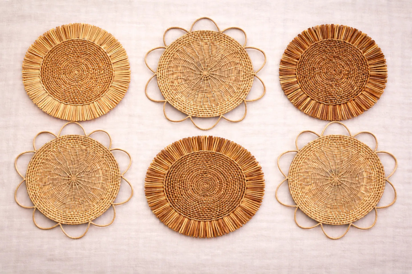 Autumn Harvest table setting featuring an earth-toned handwoven charger plate with rustic fall-inspired bohemian accessories.