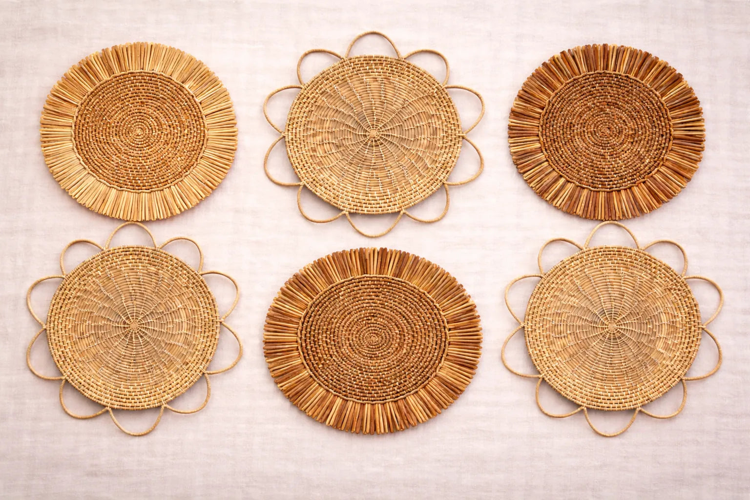 Autumn Harvest table setting featuring an earth-toned handwoven charger plate with rustic fall-inspired bohemian accessories.