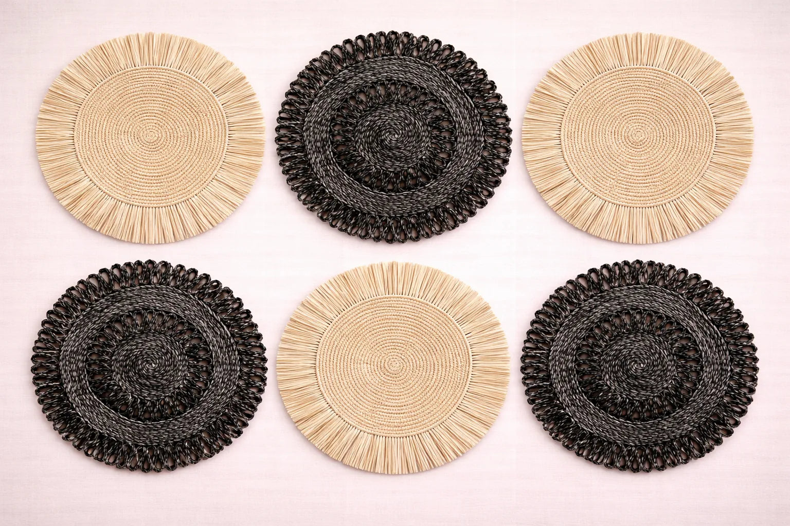 Natural Contrast table setting featuring black and white beige handwoven raffia and abaca charger plates with minimalist boho accessories.